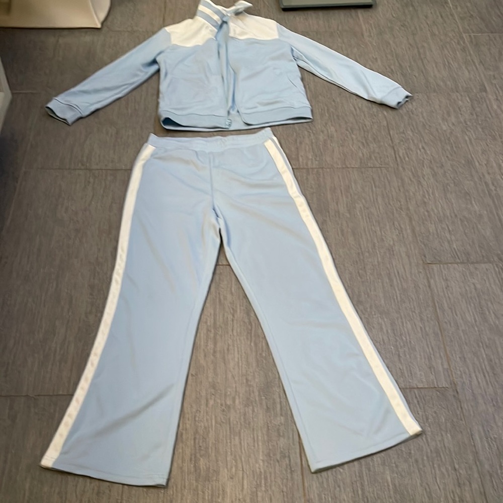 Junior size sweatsuit pants are large and jacket is a medium